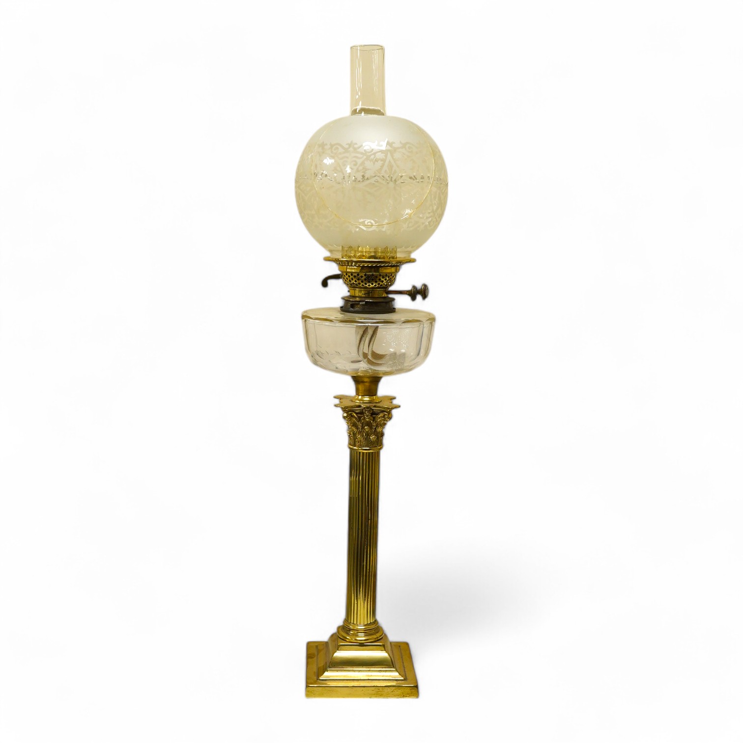 An Edwardian brass Corinthian columned oil lamp, 77cm high including funnel and shade. Condition - column good glass bowl, brass figments and funnel good, shade broken